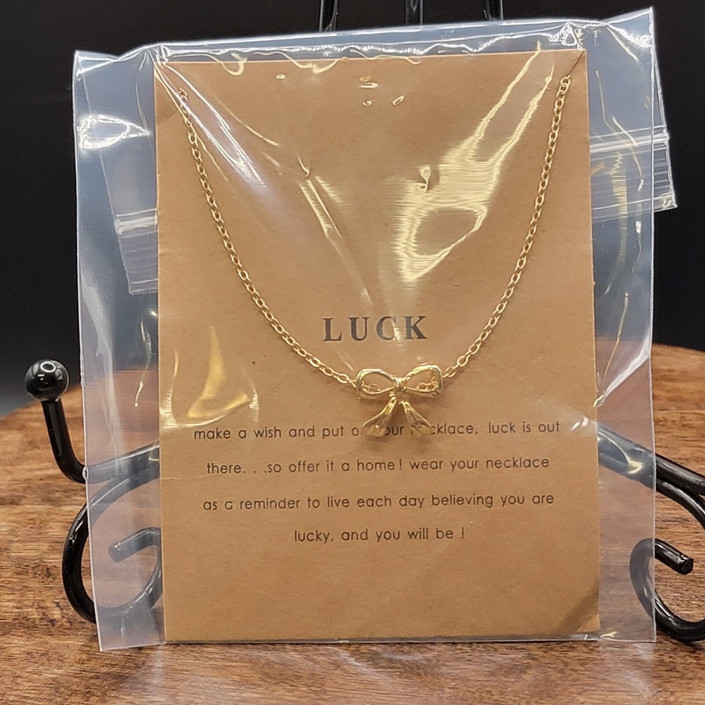 Bow Gift Of Luck Gold Tone Necklace